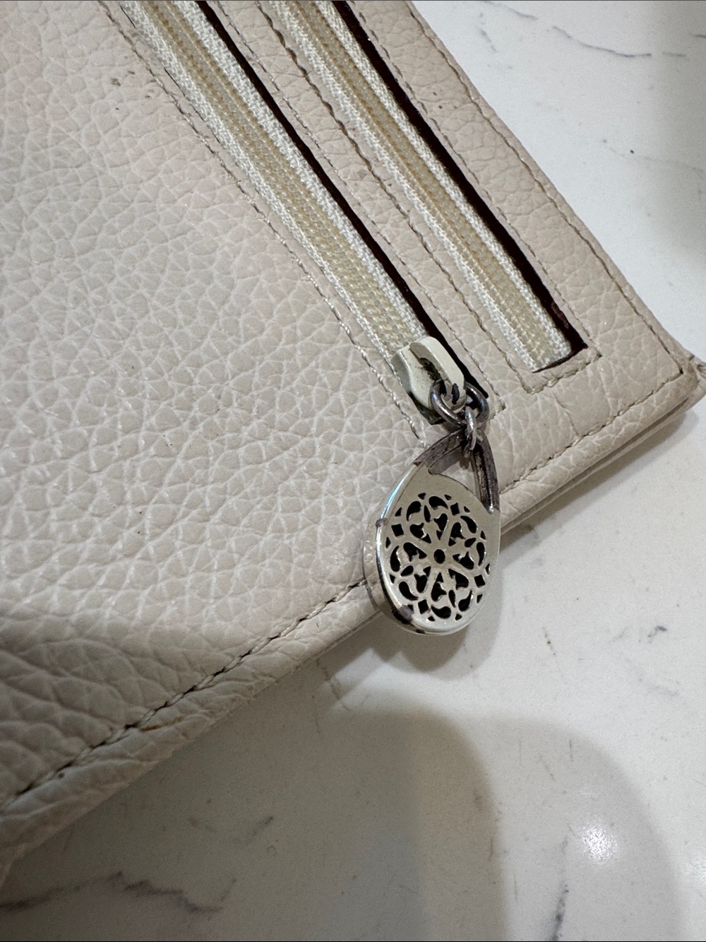 Brighton Cream Pebbled Leather Ferrara Fold Wallet with Embossed Medallion - Picture 12 of 13